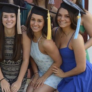 Open back graduation dress with overlay detail.